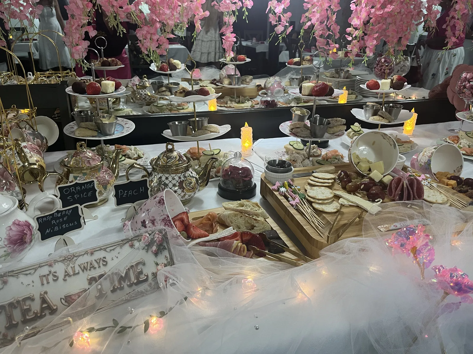 A downstairs large-party table personalized with guest-provided decor