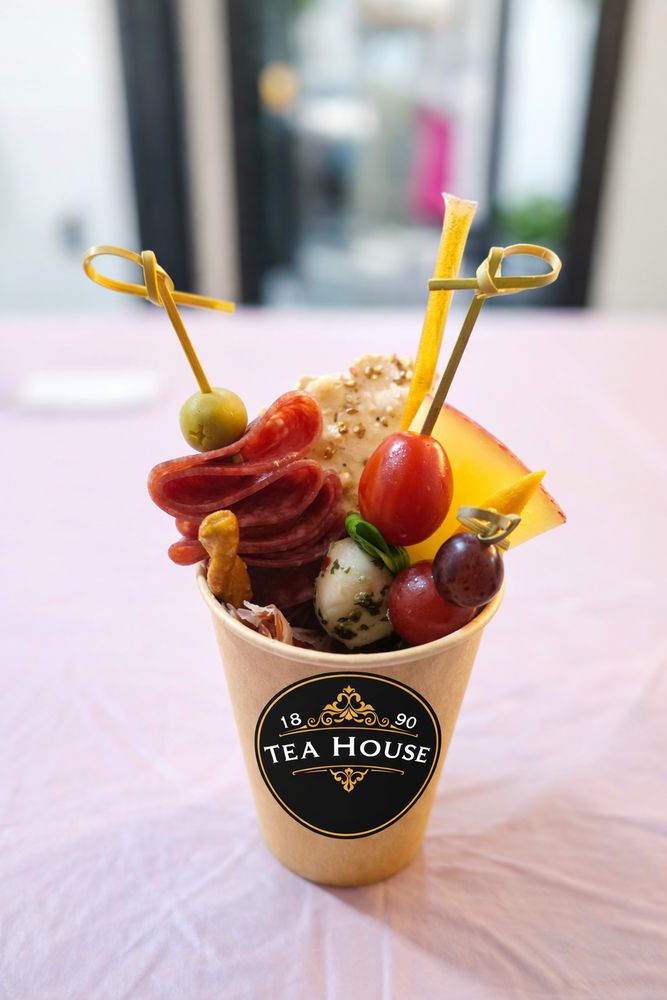 A signature 1890 Tea House charcuterie cup