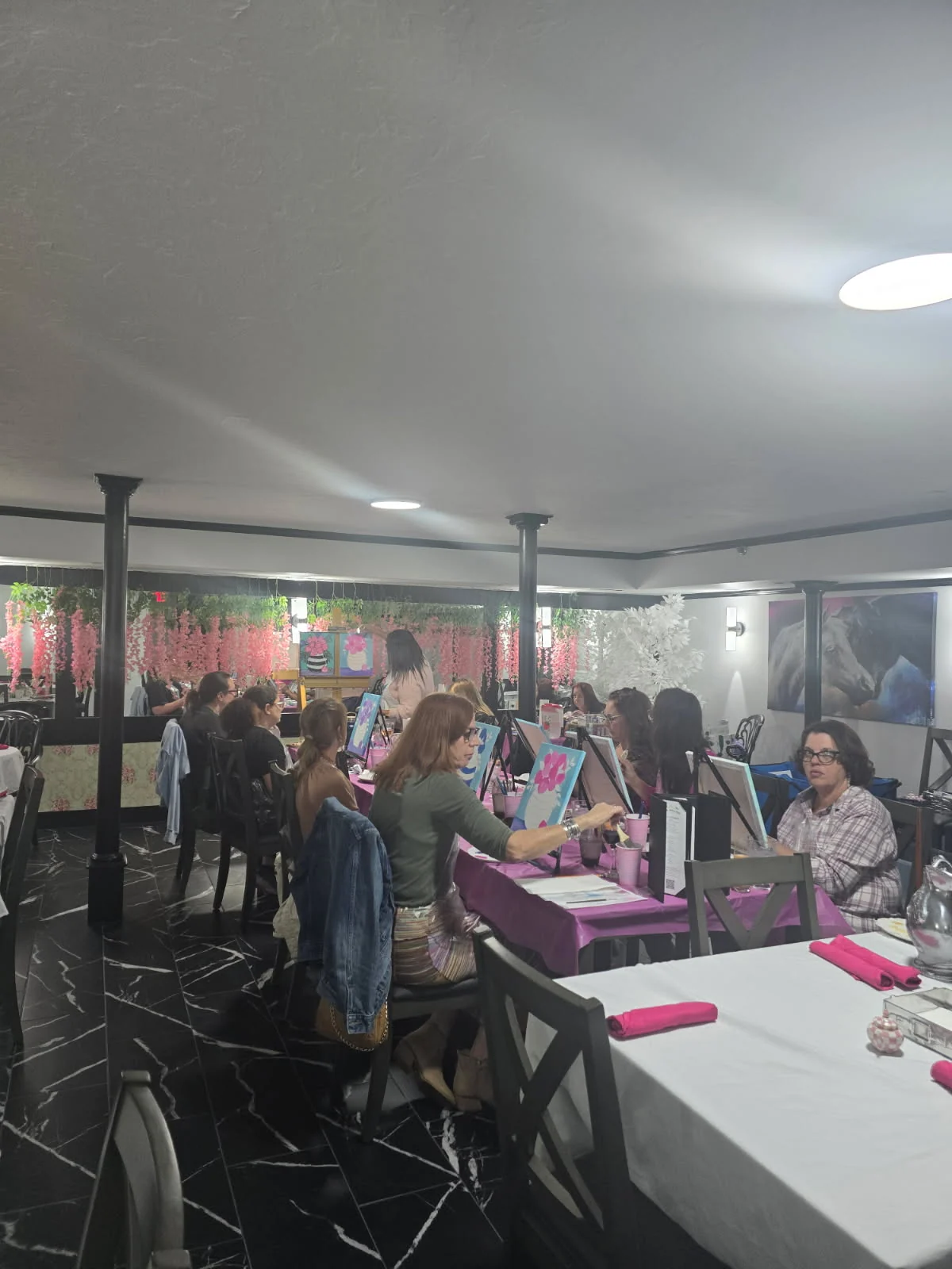 A full gathering inside 1890 Tea House