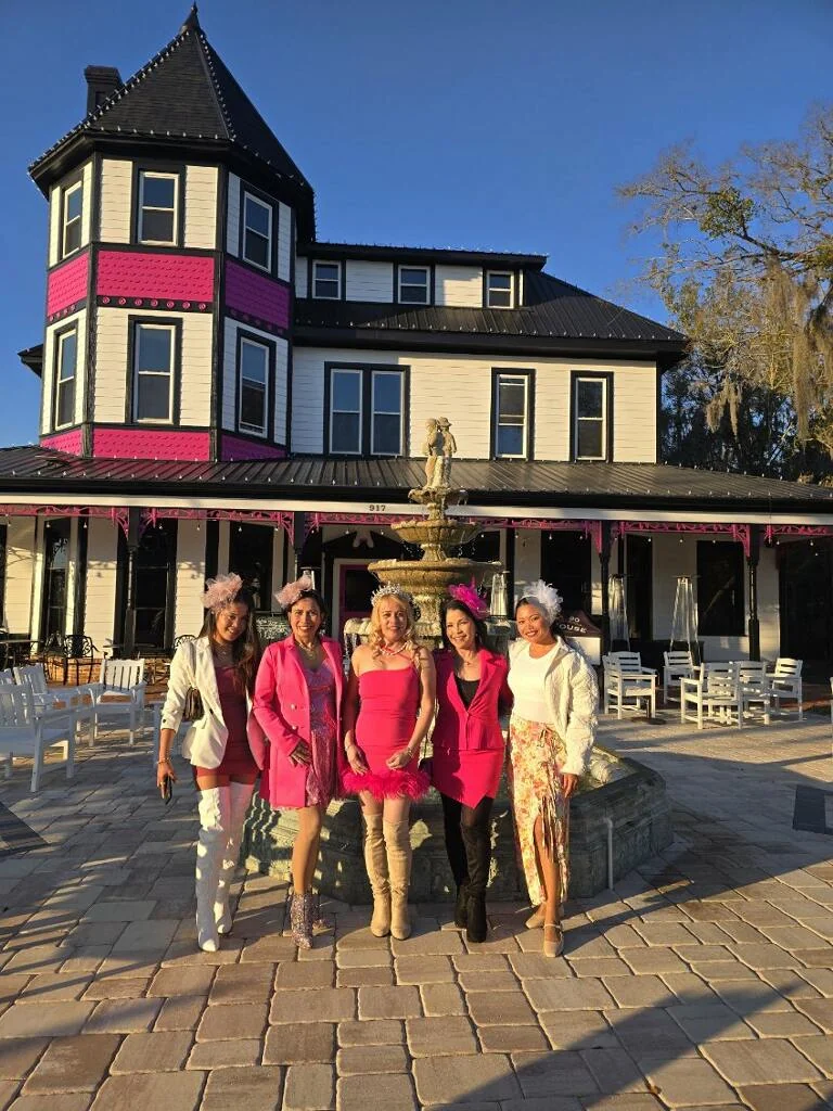 Birthday guests gathered on the patio in front of 1890 Tea House
