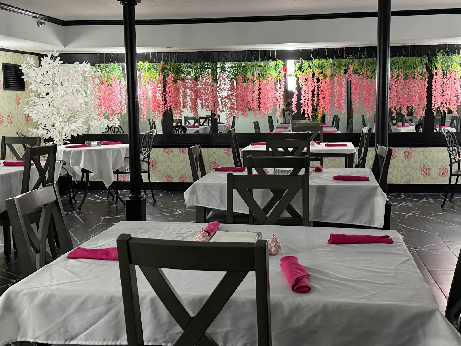A private room at 1890 Tea House with tea service set for guests